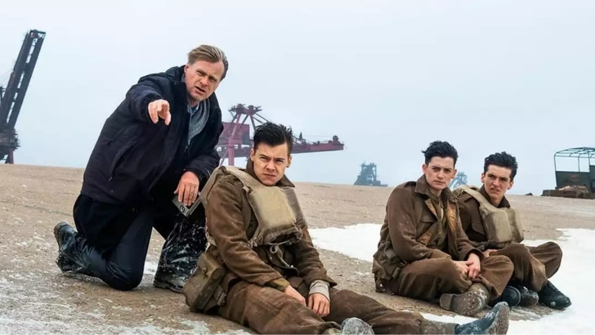 Christopher Nolan dirige atores durante as filmagens de Dunkirk