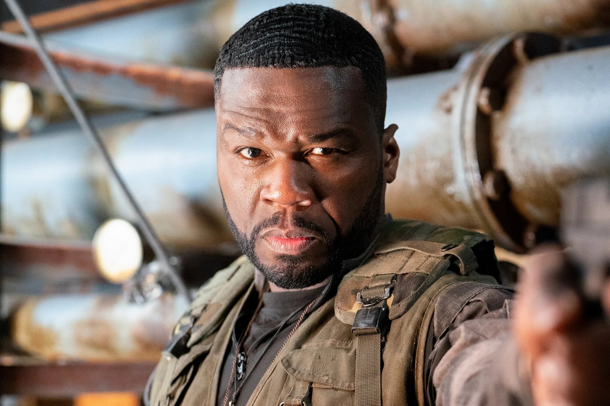 50 Cent como Easy Day em Os Mercenários 4 especialista em armas pesadas