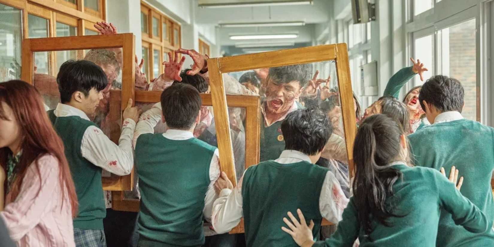 Cena da série Todos Nós Estamos Mortos com personagens em situação de tensão e drama